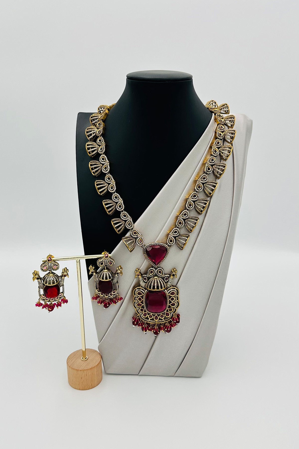 Emerald Eclat: Brass Brilliance in CZ and Gemstone Fusion - swadeshsouq.com