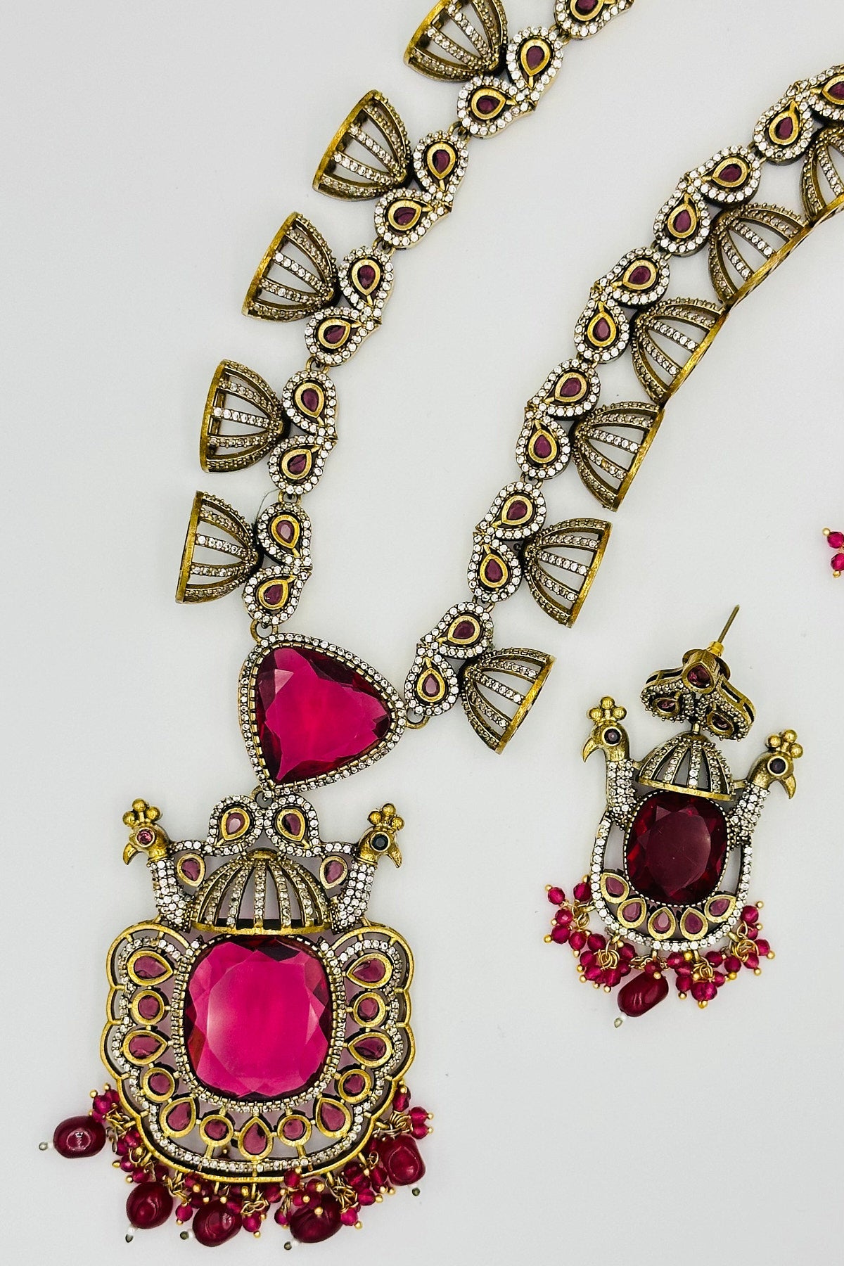 Emerald Eclat: Brass Brilliance in CZ and Gemstone Fusion - swadeshsouq.com