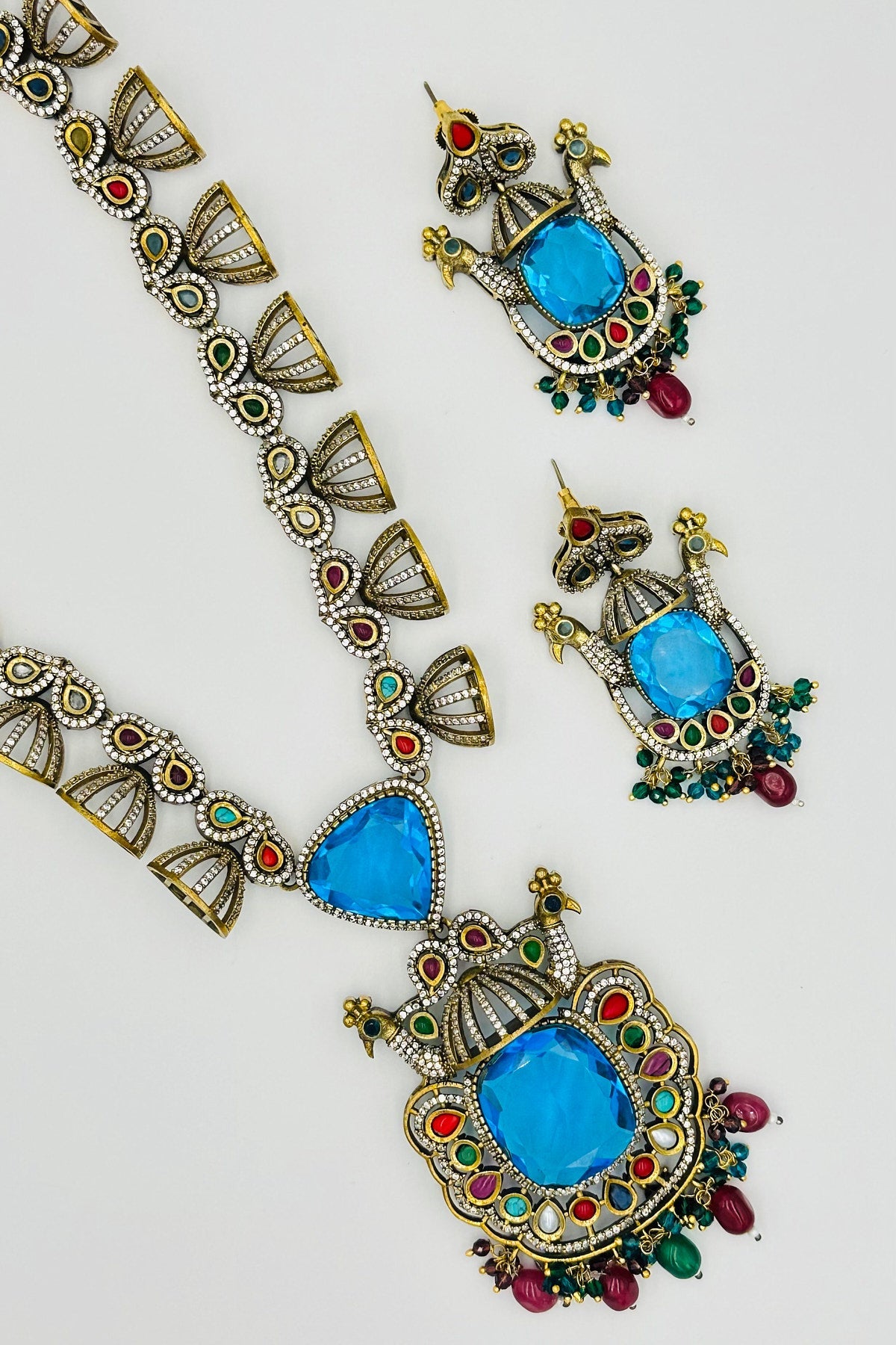 Emerald Eclat: Brass Brilliance in CZ and Gemstone Fusion - swadeshsouq.com