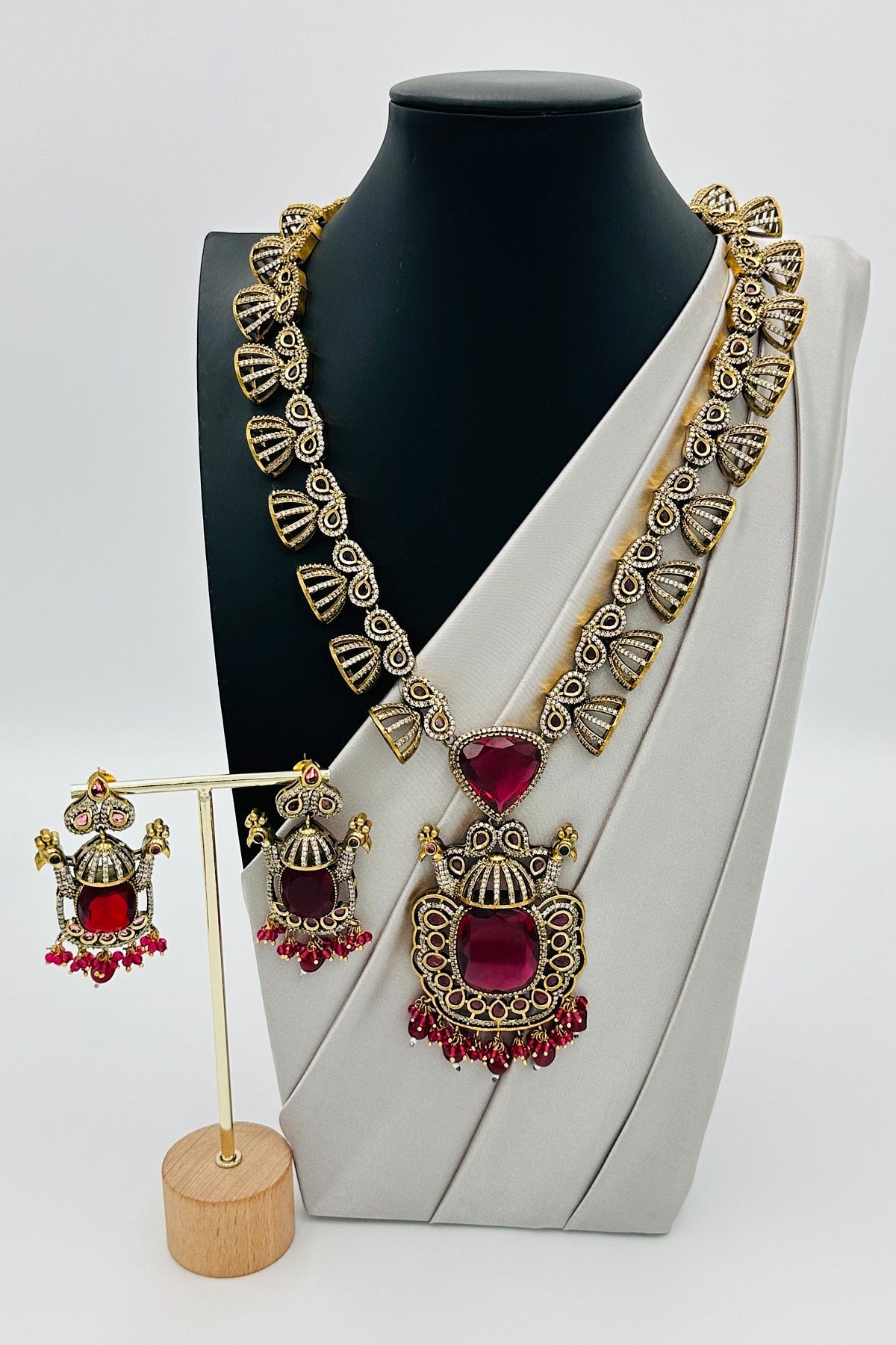 Emerald Eclat: Brass Brilliance in CZ and Gemstone Fusion - swadeshsouq.com