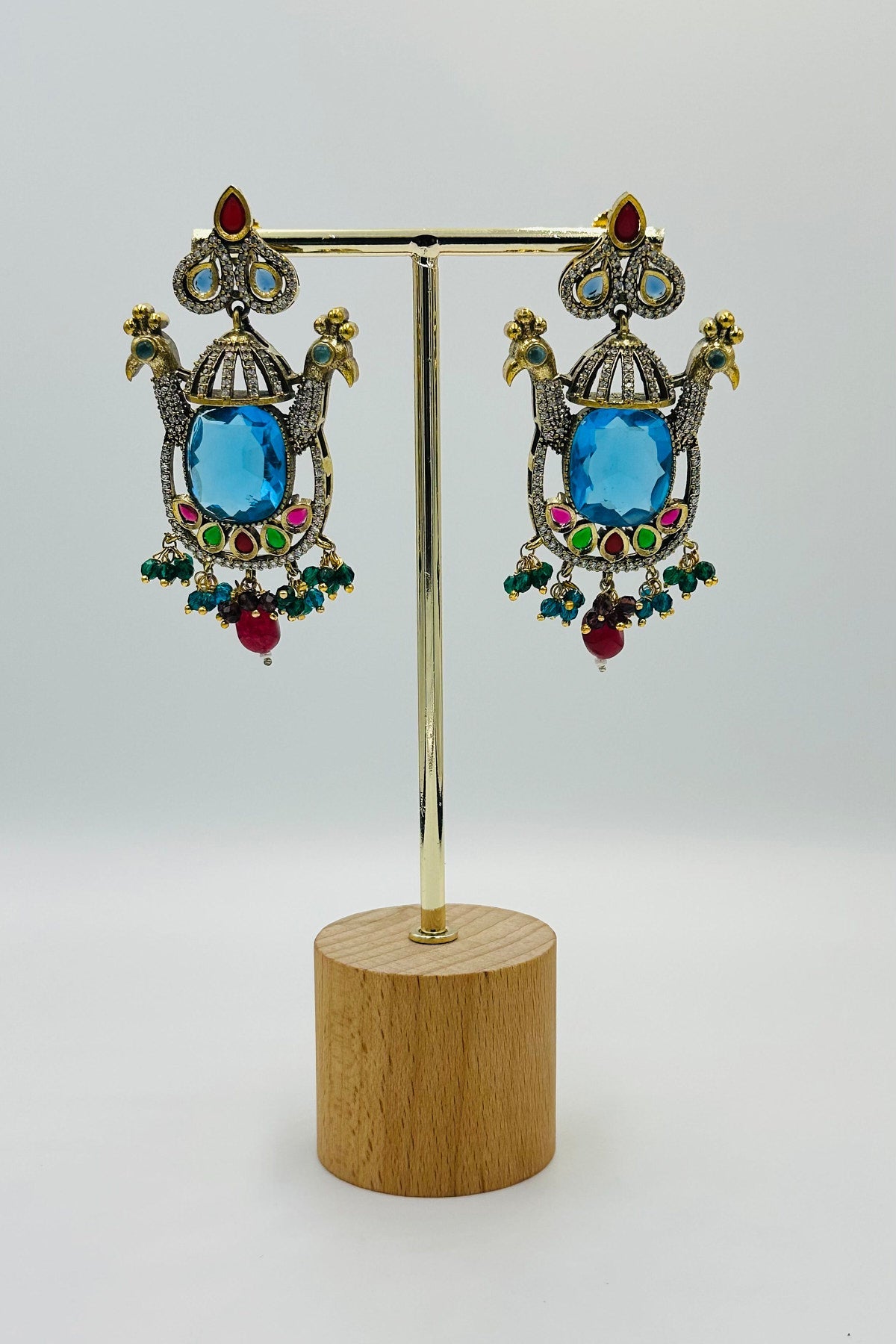 Emerald Eclat: Brass Brilliance in CZ and Gemstone Fusion - swadeshsouq.com