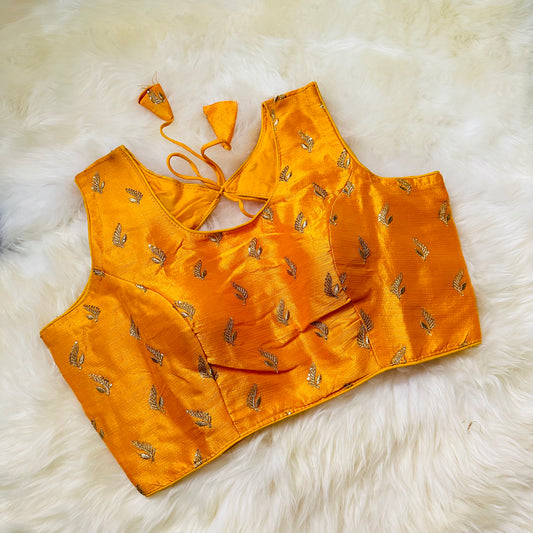 Radiant Yellow Raw Silk Blouse with Golden Aari Detailing