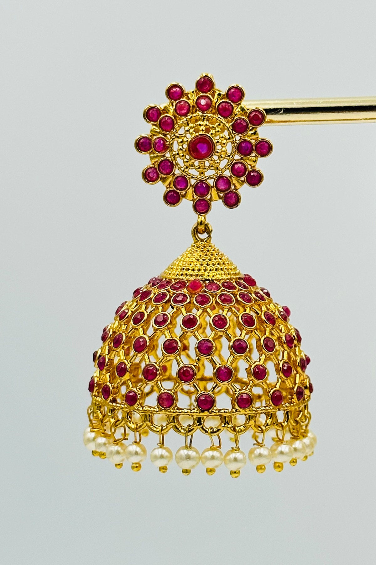 Jaal Pattern Jhumka Earrings with Stones and Pearls