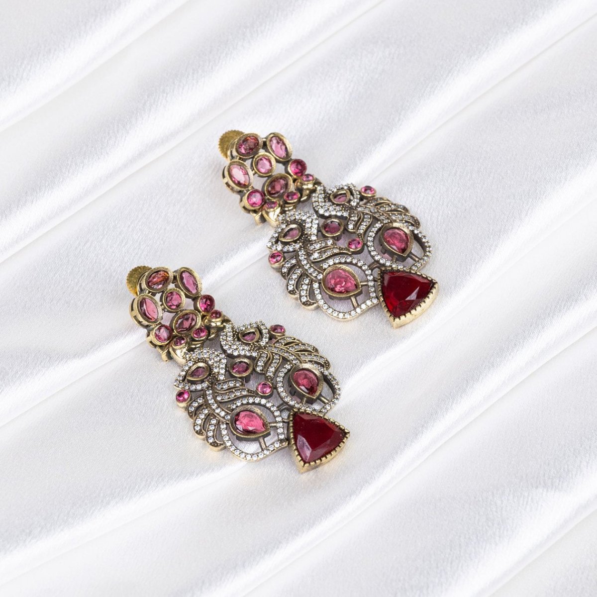 Enchanting Rose Plume Earrings – Bold Elegance Redefined - swadeshsouq.com