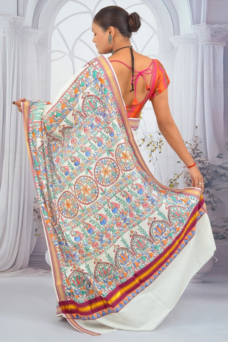 Ivory Elegance – Madhubani Art Hand - Painted Kerala Cotton Saree with Vibrant Floral Narratives - swadeshsouq.com