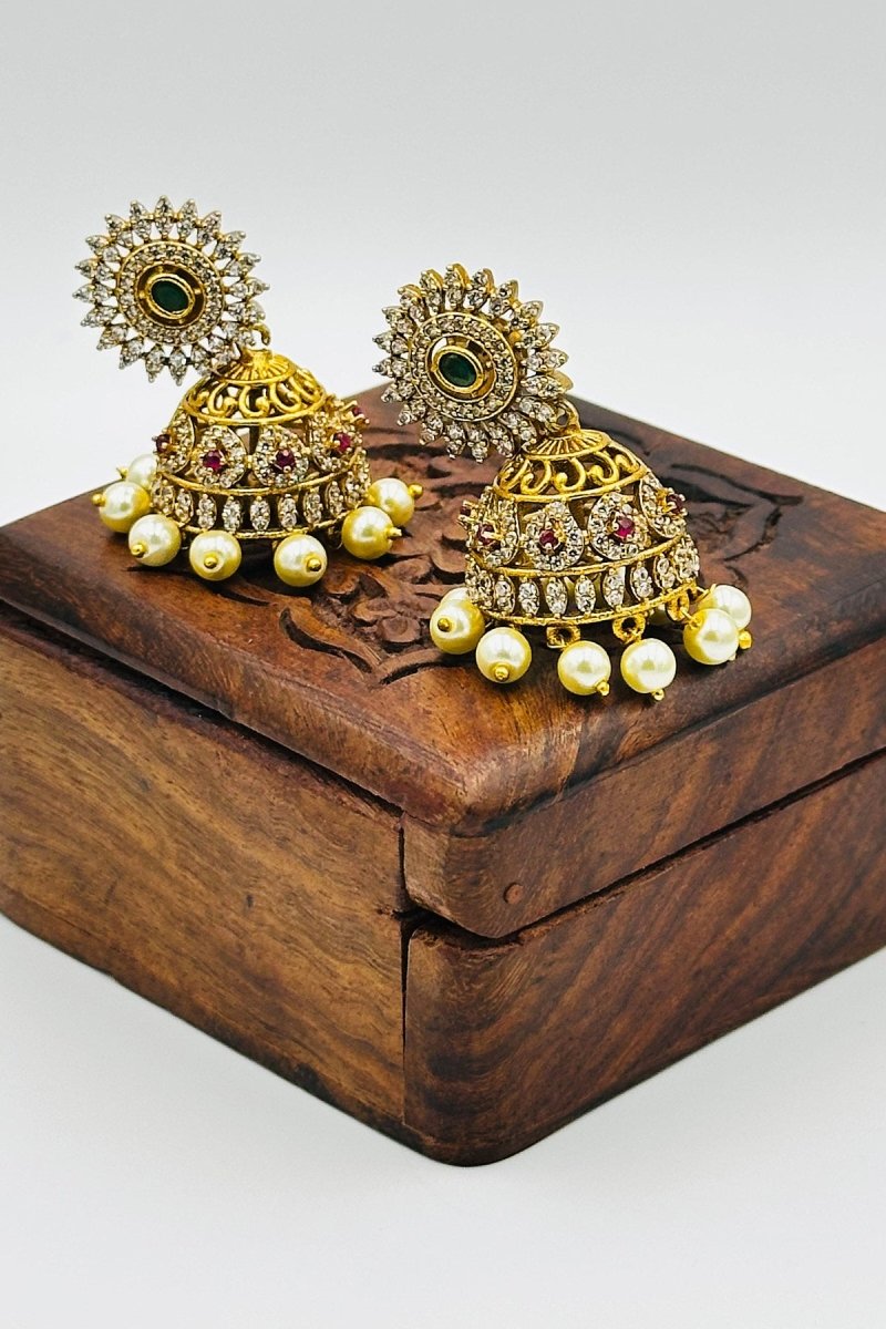 Luxurious Gold Jhumkas with CZ Stones, Pearl Drops, and Green Accents - swadeshsouq.com