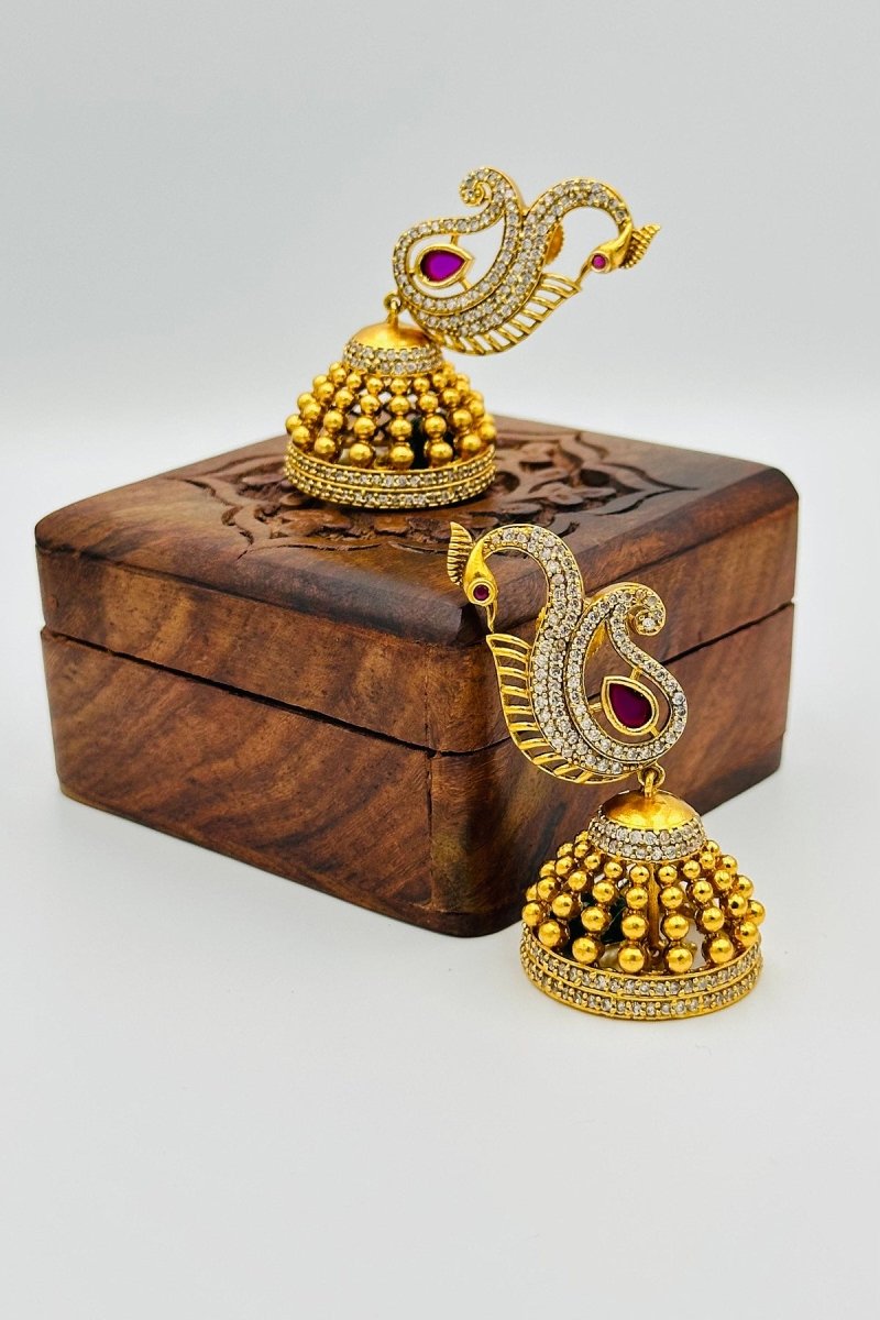 Peacock Design Gold - Plated Jhumkas with Green Stone and CZ Accents - swadeshsouq.com