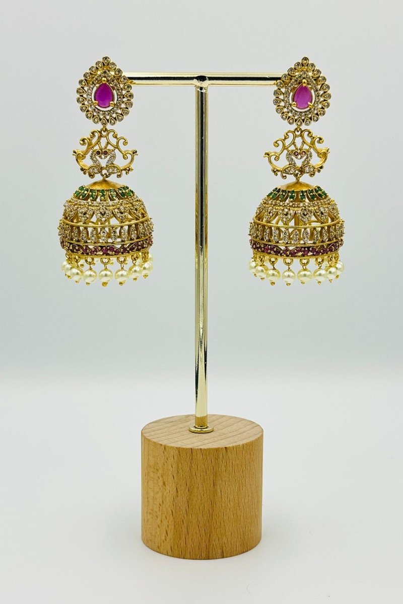 Royal Gold - Plated Jhumkas with Pink Stone, CZ, and Pearl Detailing - swadeshsouq.com