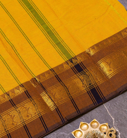 Add a Touch of Elegance with Our Bright Mustard Yellow Temple Design Zari Border Chettinad Cotton Saree - swadeshsouq.com