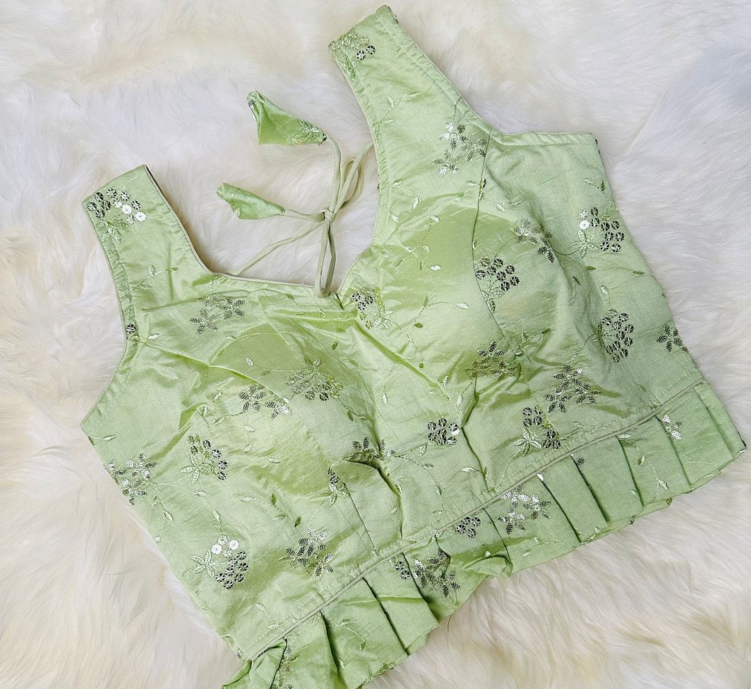 Add Elegance to Your Wardrobe with Our Pale Pista Green Frilled Blouse with Foil Sisha Work - swadeshsouq.com