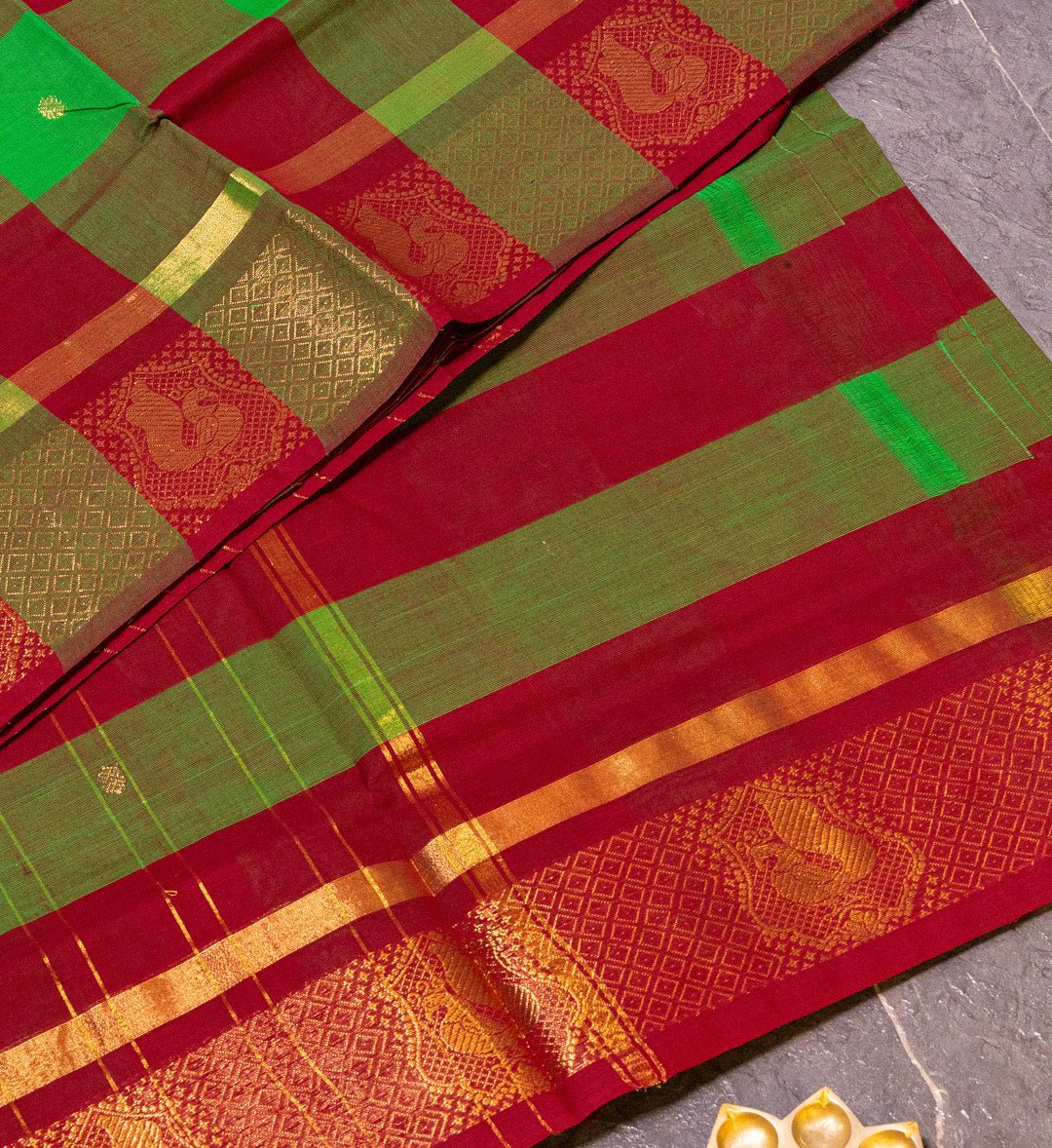 Adorn Yourself with the Green and Maroon Plaid Saree with Zari Butta Embellishments. - swadeshsouq.com