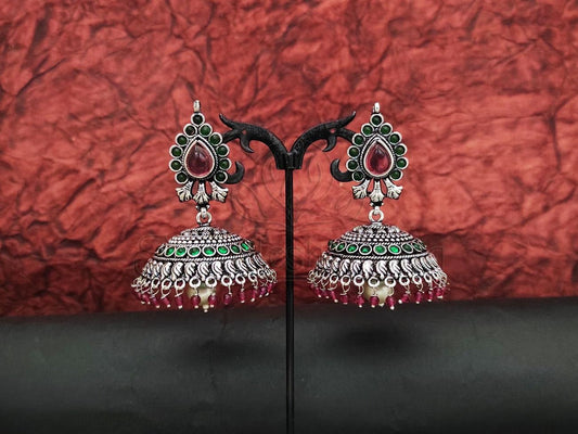 Antique Beauty: Oxidized Silver Jhumkas Adorned with Ruby and Emerald Embellishments. - swadeshsouq.com