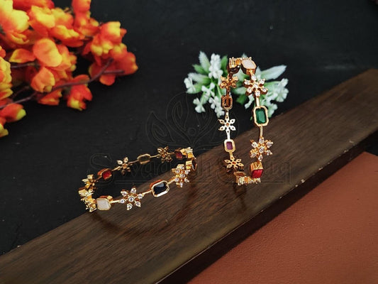 Blossoming Beauty: The Sparkling Floral Design Studded Bangles. - swadeshsouq.com