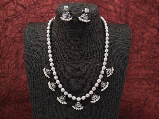 Classic and Modern - Oxidized Silver Necklace with Jhumka and Pearl Embellishments. - swadeshsouq.com