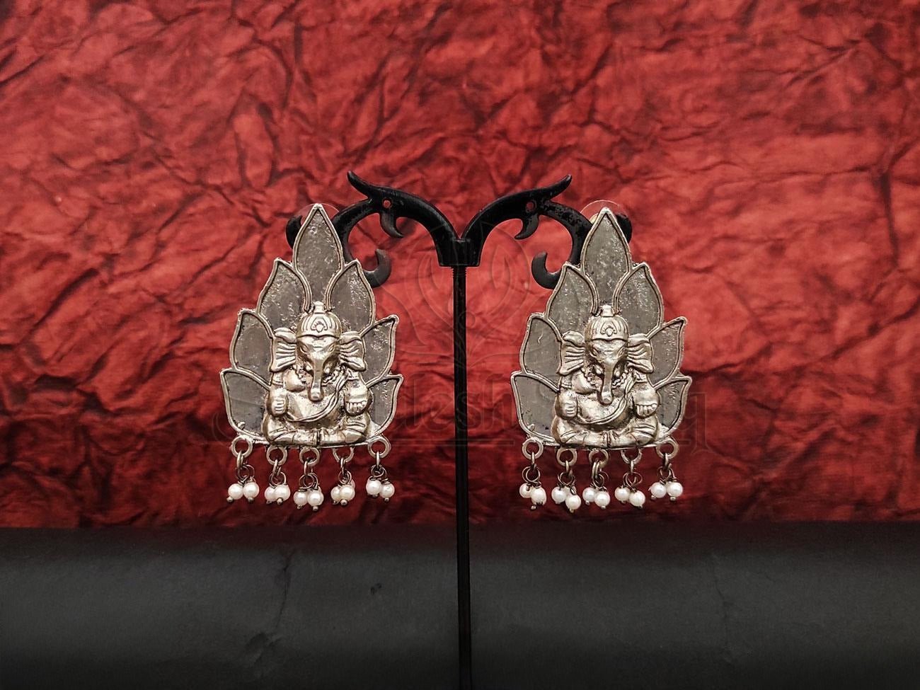 Embrace divine beauty with Antique Design & Ganesha Motif Oxidised Silver Earrings from swadeshsouq.com.