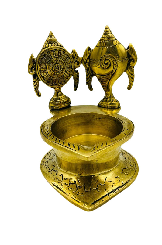 Divine Radiance: Intricately Designed Shanku Chakra Diya - swadeshsouq.com