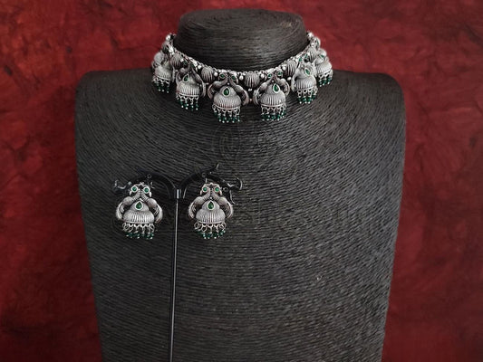 Elegant Oxidised Silver Choker Set with Majestic Bird Motif and Green Bead Embellishments. - swadeshsouq.com