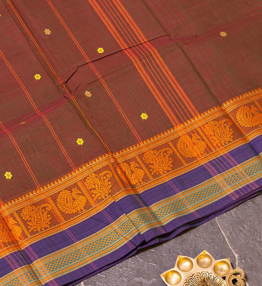 Elegant Brown & Lavender Dual-Toned Chettinad Cotton Saree, All-Over Motifs & Thread Borders. Shop now on swadeshsouq.com.