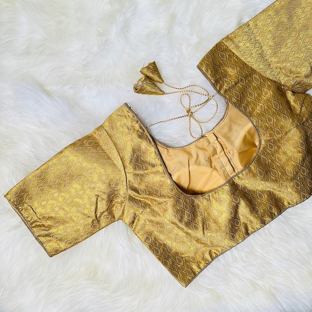 Embrace Royalty with a Golden Cream Brocade Blouse with Golden Leaf Patterns. - swadeshsouq.com