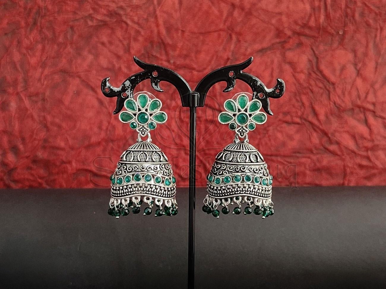 Emerald Embossed Oxidised Silver Jhumkas with Fluid Green Beads. - swadeshsouq.com