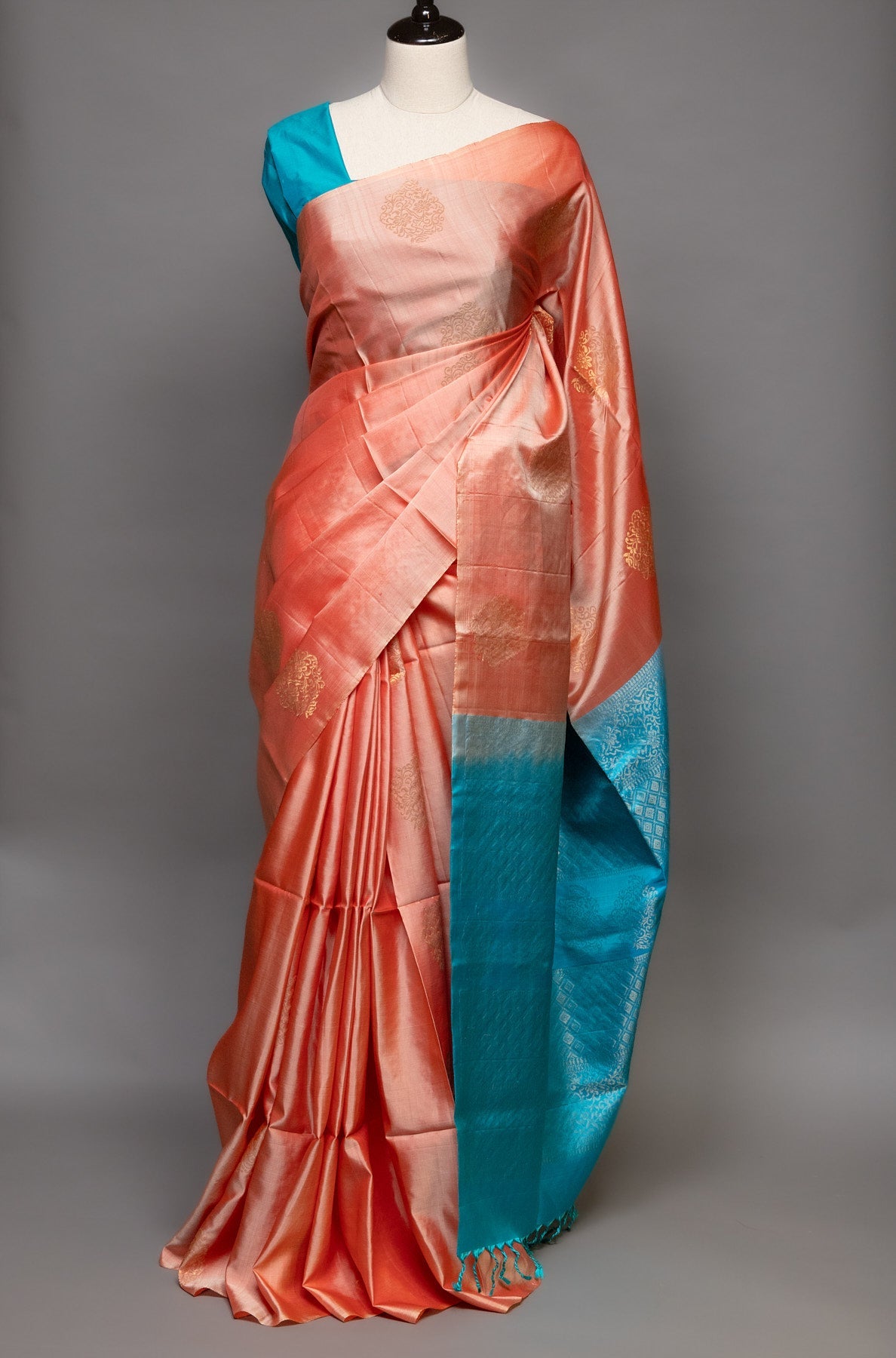 ENCHANTING BLISS: LIGHT PEACH AND SKY BLUE KANJEEVARAM SILK SAREE - swadeshsouq.com