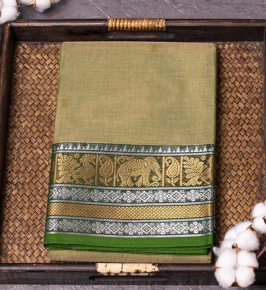 Embrace enchanting elegance with Moss Green Chettinad Cotton Saree w/ Gold & Silver Zari Border from swadeshsouq.com.