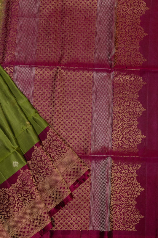 ENCHANTING FINESSE: DEEP OLIVE GREEN AND MAGENTA KANJEEVARAM SILK SAREE WITH CONTRAST ZARI BORDERS - swadeshsouq.com