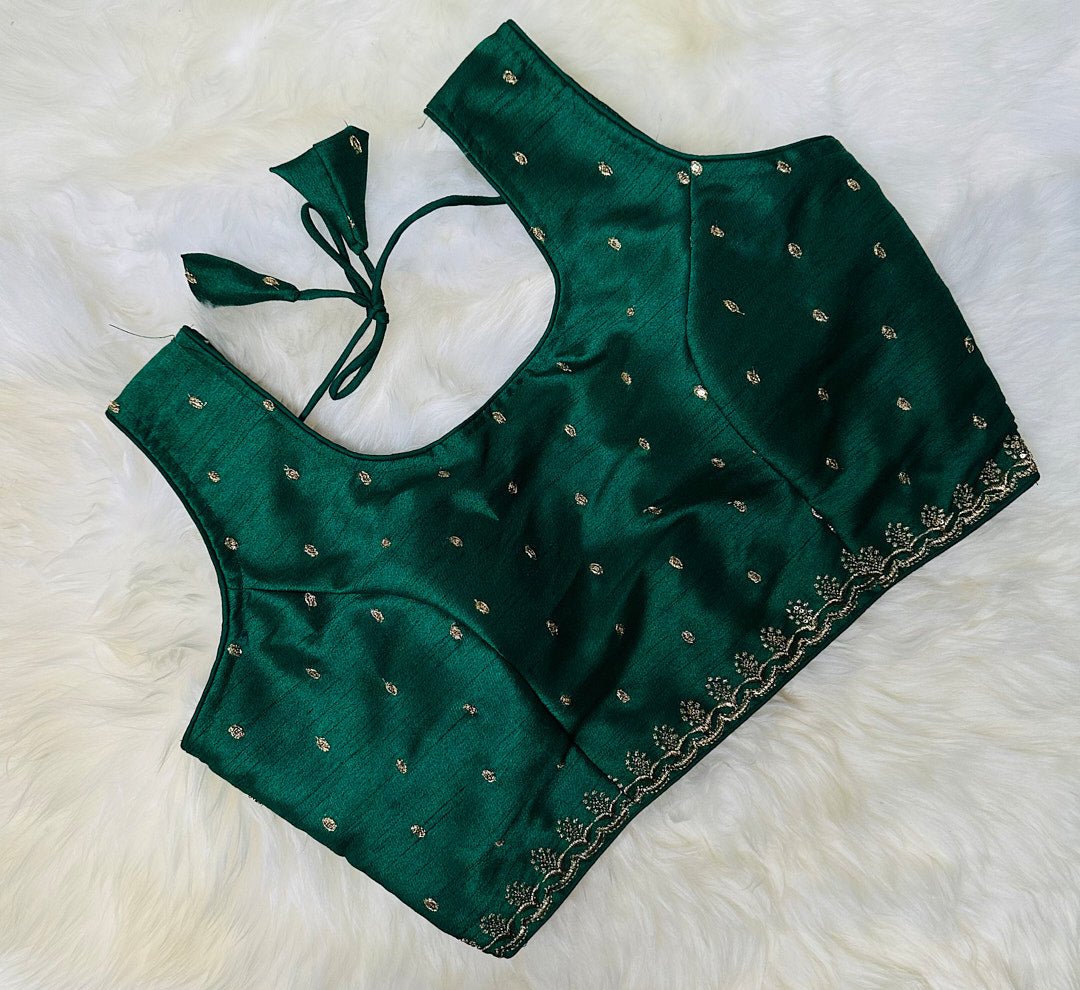 Enchanting Jaipuri Charm: Adorn Yourself with the Green Raw Silk Blouse with Golden Buttis. - swadeshsouq.com