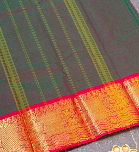 Embrace ethereal beauty with Green & Pink Dual-Toned Chettinad Cotton Saree w/ Red Zari Border from swadeshsouq.com.