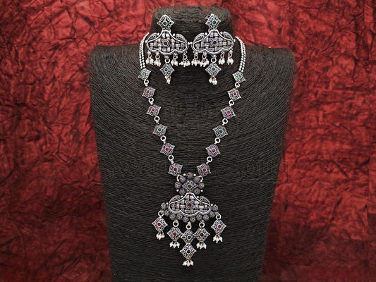 Exquisite Oxidized Silver Long Chain with Ruby and Emerald Danglers and Pearl Tassels. - swadeshsouq.com