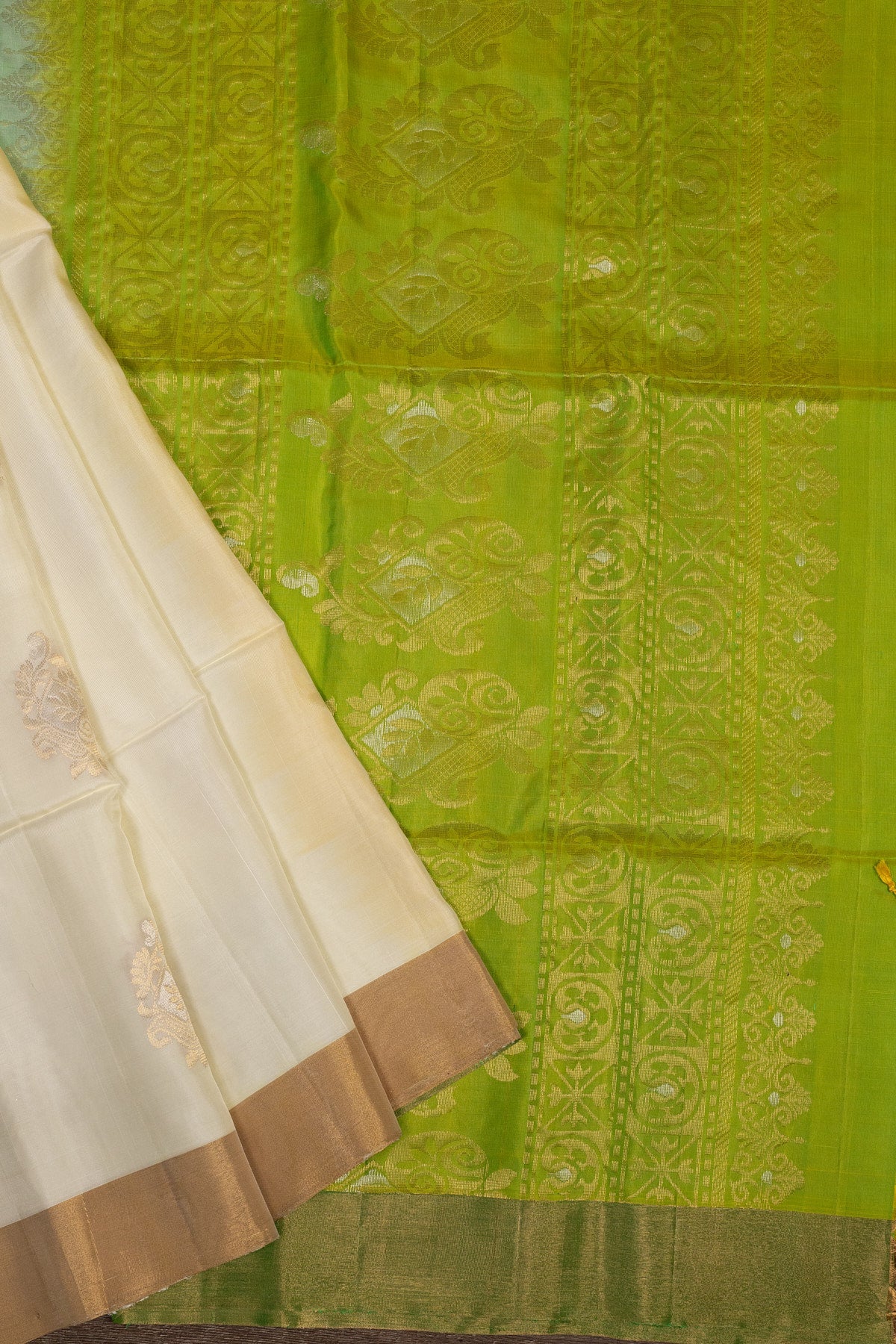 GOLDEN AURA: PISTA GREEN AND GOLDEN CREAM KANJEEVARAM SILK SAREE - swadeshsouq.com