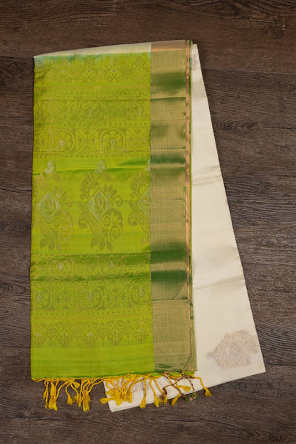 GOLDEN AURA: PISTA GREEN AND GOLDEN CREAM KANJEEVARAM SILK SAREE - swadeshsouq.com