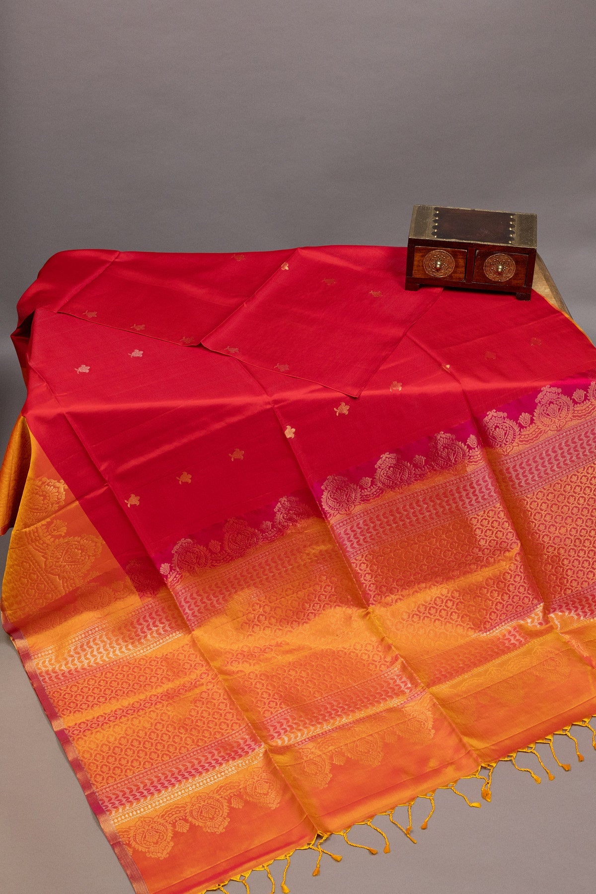 GOLDEN TRADITIONS: RED AND YELLOW KANJEEVARAM SILK SAREE WITH INTRICATELY WOVEN ZARI BORDERS - swadeshsouq.com