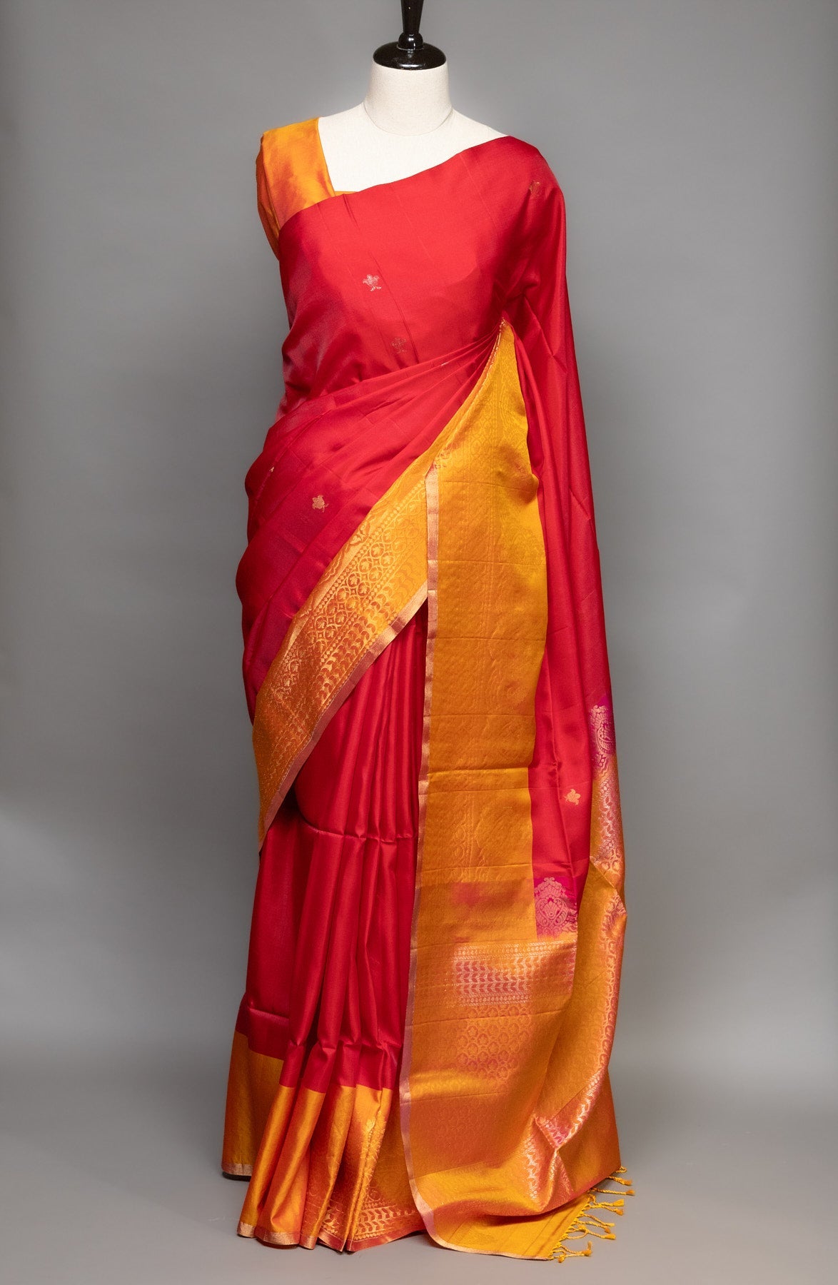 GOLDEN TRADITIONS: RED AND YELLOW KANJEEVARAM SILK SAREE WITH INTRICATELY WOVEN ZARI BORDERS - swadeshsouq.com