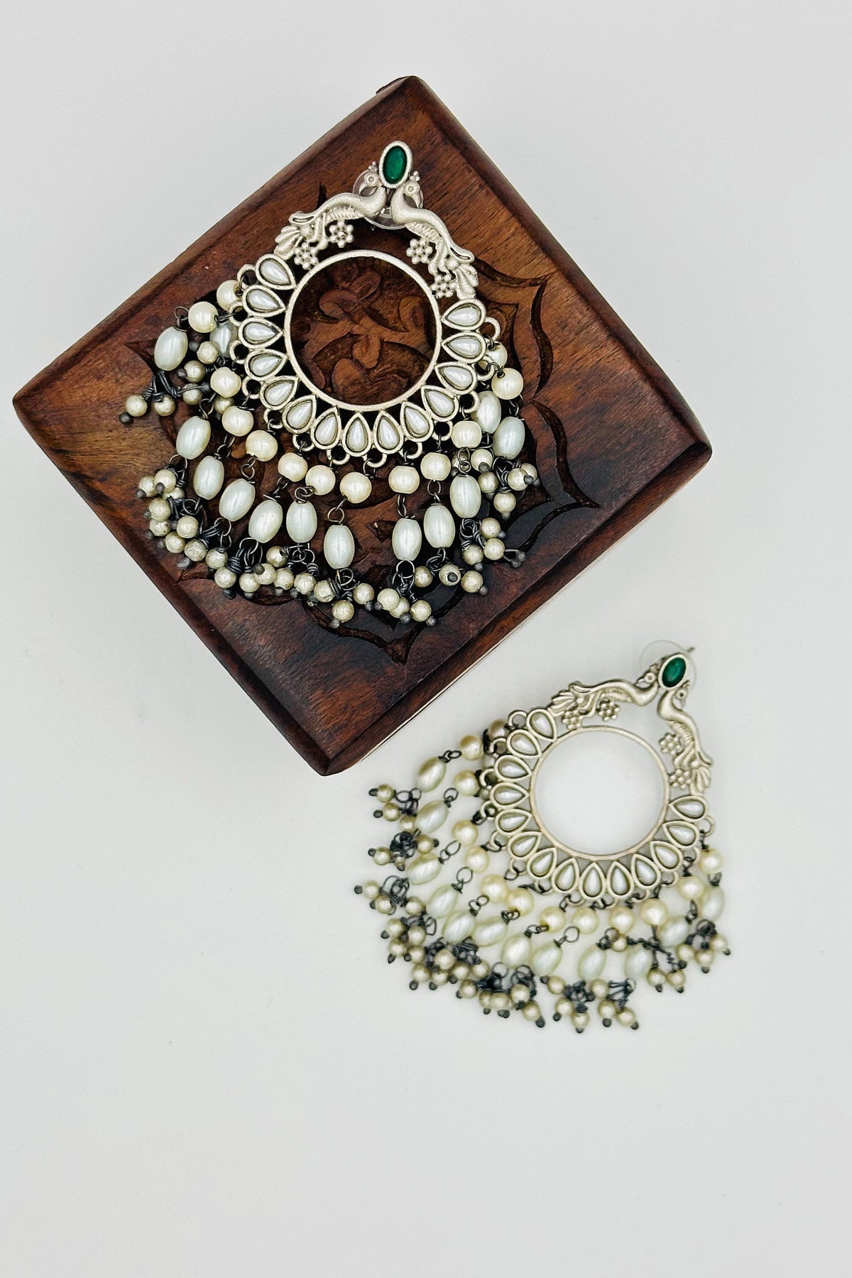 Green Chandbali Earrings with Peacock Motif and Pearl Accents - swadeshsouq.com