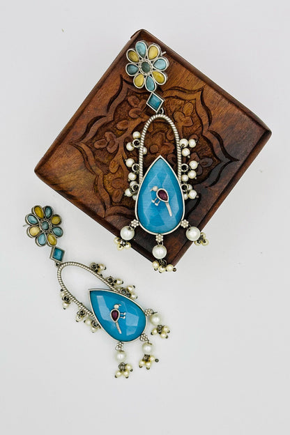 Handcrafted Silver Earrings with Feroza and Yellow Crystal Accents and Bird Embellishment - swadeshsouq.com