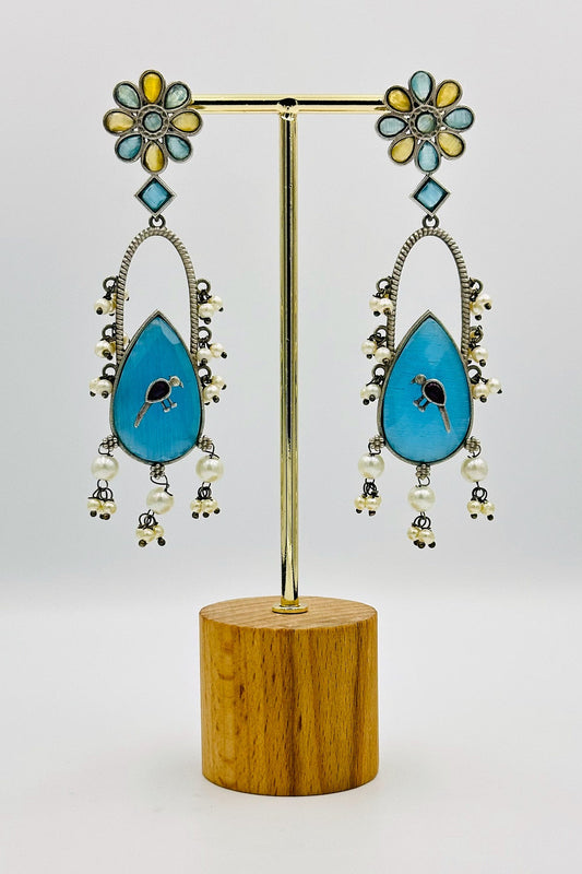 Handcrafted Silver Earrings with Feroza and Yellow Crystal Accents and Bird Embellishment - swadeshsouq.com