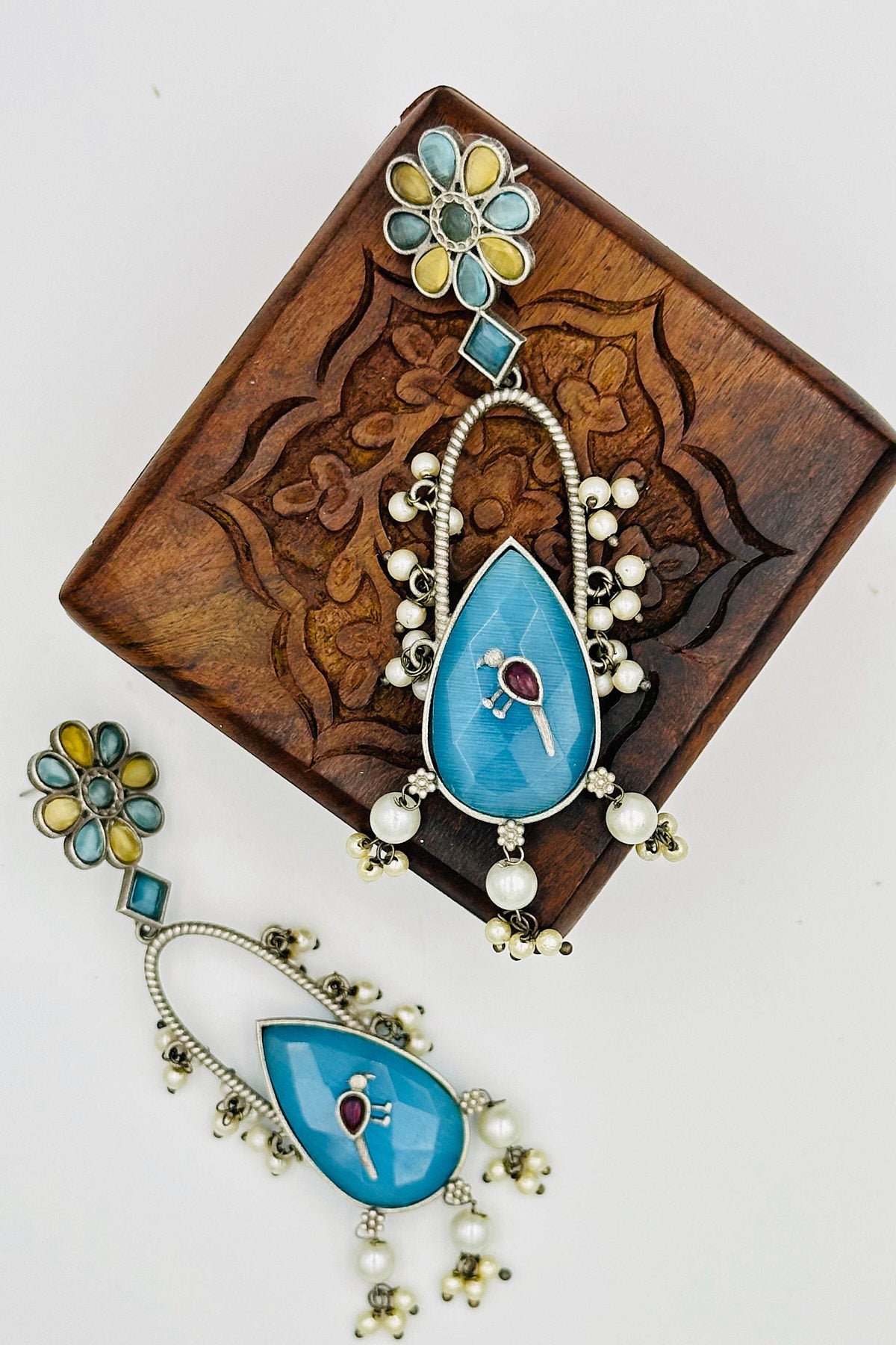 Handcrafted Silver Earrings with Feroza and Yellow Crystal Accents and Bird Embellishment - swadeshsouq.com