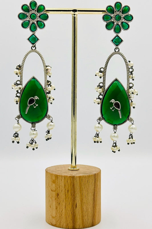 Handcrafted Silver Earrings with Green Crystal Accents and Bird Embellishment - swadeshsouq.com