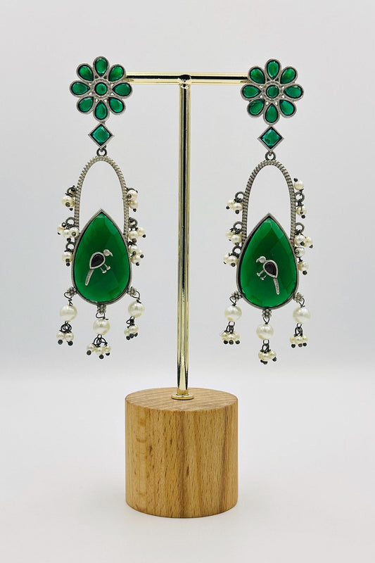 Handcrafted Silver Earrings with Green Crystal Accents and Bird Embellishment - swadeshsouq.com