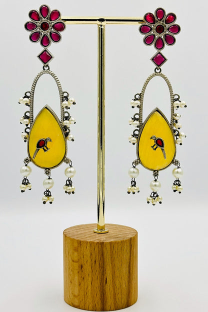 Handcrafted Silver Earrings with Red and Yellow Crystal Accents and Bird Embellishment - swadeshsouq.com