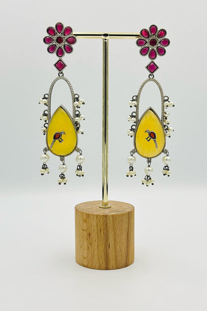 Handcrafted Silver Earrings with Red and Yellow Crystal Accents and Bird Embellishment - swadeshsouq.com