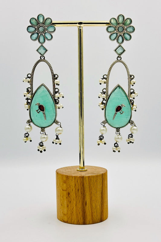 Handcrafted Silver Earrings with Turquoise Blue Crystal Accents and Bird Embellishment - swadeshsouq.com