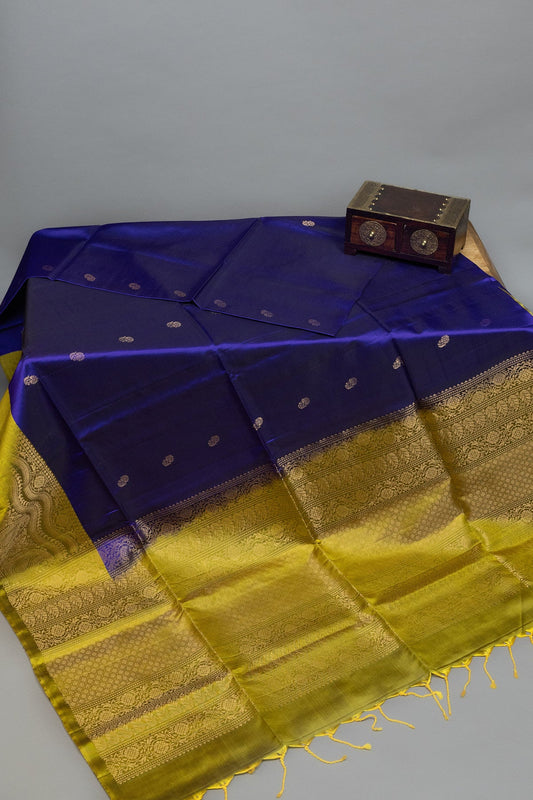 MAJESTIC SYMPHONY: ROYAL BLUE AND MUSTARD YELLOW KANJEEVARAM SILK SAREE - swadeshsouq.com