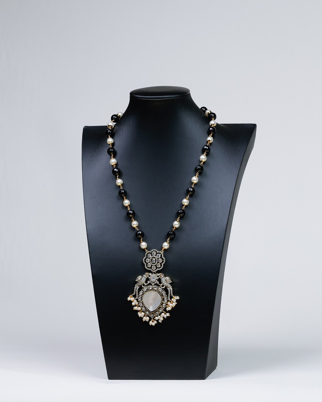 Noir Allure: Parrot-Adorned Black Crystal & Pearl Ensemble - swadeshsouq.com