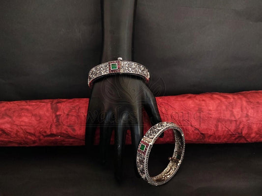 Oxidised Silver Bangles with Ruby and Emerald Embellishments and Antique Floral Design. - swadeshsouq.com