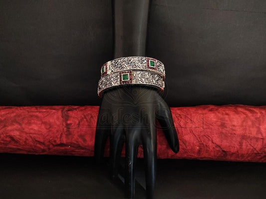 Oxidised Silver Bangles with Ruby and Emerald Embellishments and Antique Floral Design. - swadeshsouq.com