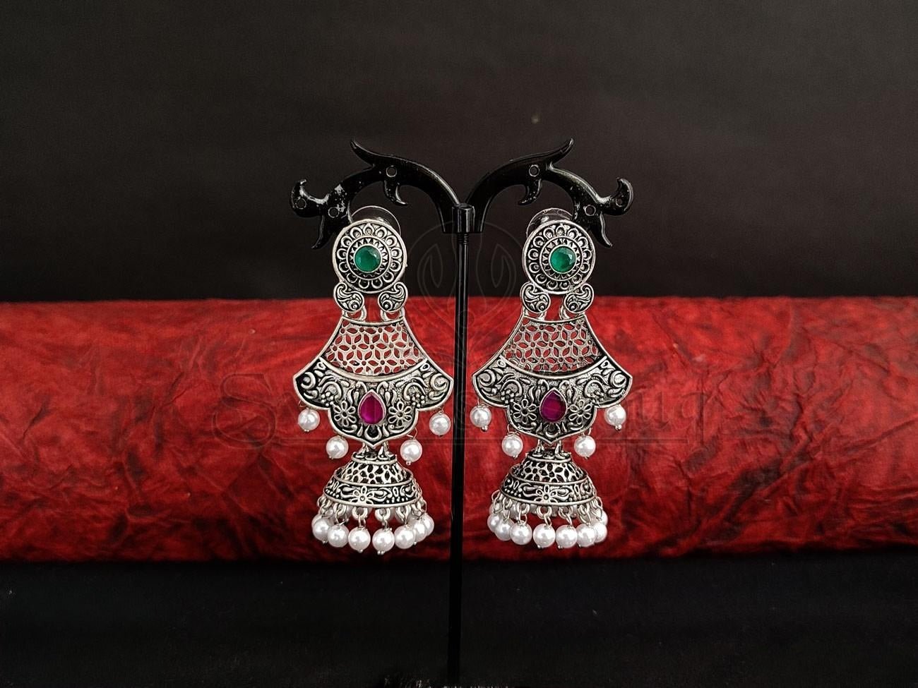 Oxidised Silver Jhumka Earrings with Intricate Jaal Design and Radiant Gemstone Detailing. - swadeshsouq.com