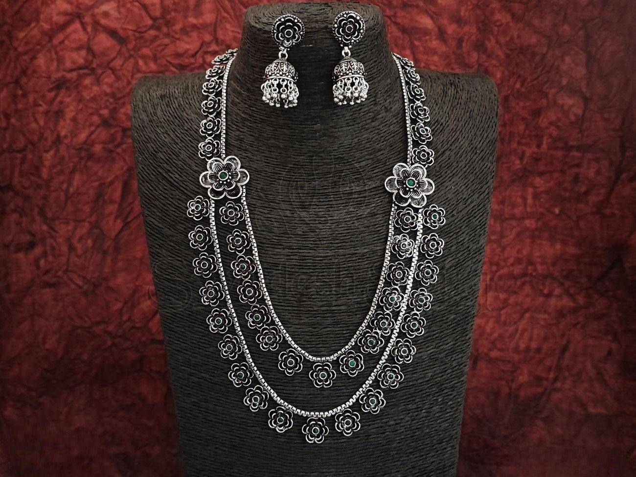 Oxidized Silver Necklace Set with Emerald Embellishments and Matching Jhumkas. - swadeshsouq.com