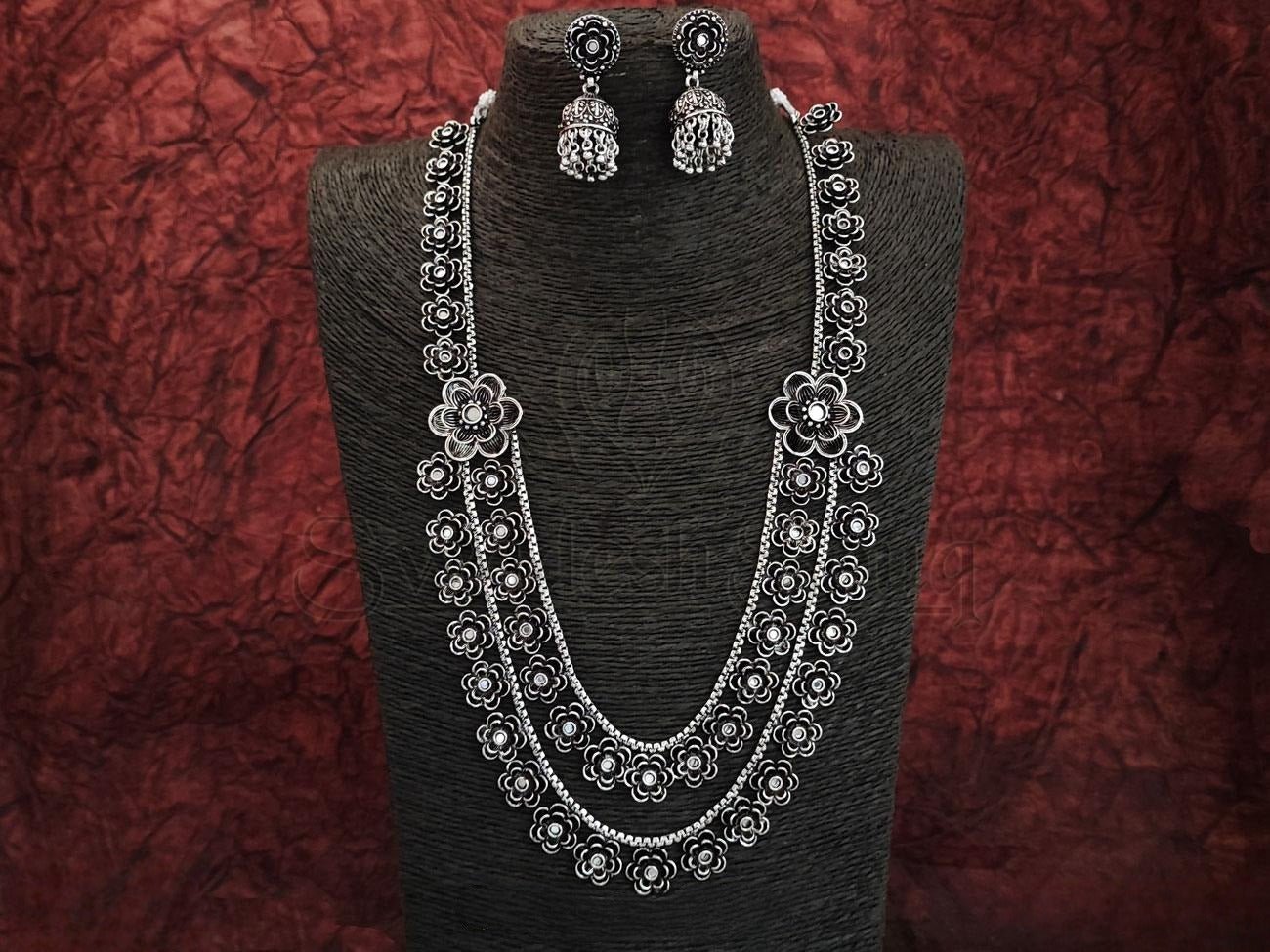 Oxidized Silver Necklace Set with Intricate White Stone Studs and Matching Jhumkas - swadeshsouq.com